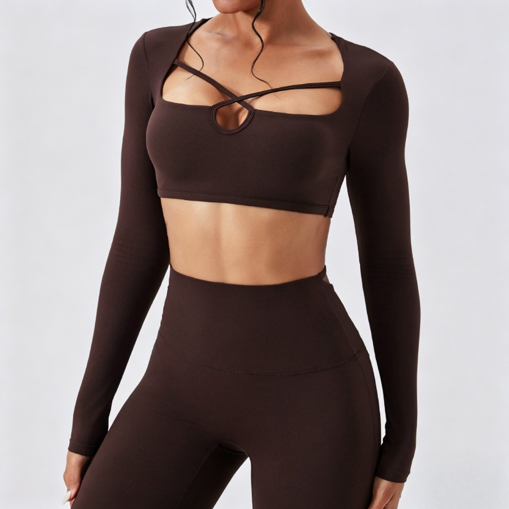 Women’s mocha brown matching cutout crop top and high waist leggings set with soft sculpting stretch fabric
