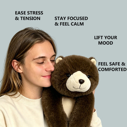 woman wearing weighted plush bear around shoulders for comfort and relaxation at home